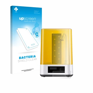Front side of a product packaging with the brand logo upscreen. Next to it is the device Anycubic Wash & Cure 3 shown with the