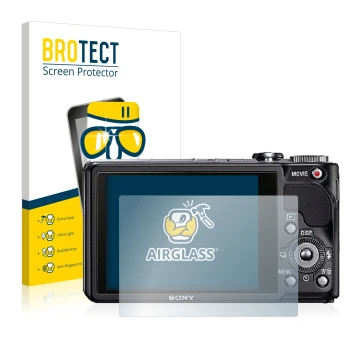 Front side of a product packaging with the brand logo BROTECT. Next to it is the device Sony Cyber-Shot DSC-HX9V shown with th