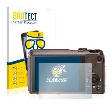 Front side of a product packaging with the brand logo BROTECT. Next to it is the device Sony Cyber-Shot DSC-HX20V shown with t
