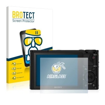 Front side of a product packaging with the brand logo BROTECT. Next to it is the device Sony Cyber-Shot DSC-RX100 shown with t