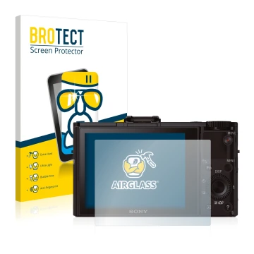 Front side of a product packaging with the brand logo BROTECT. Next to it is the device Sony Cyber-Shot DSC-RX100 II shown wit