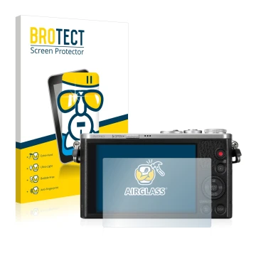 Front side of a product packaging with the brand logo BROTECT. Next to it is the device Panasonic Lumix DMC-GM1 shown with the