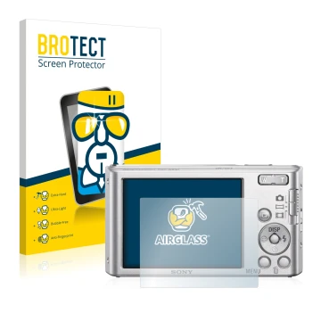 Front side of a product packaging with the brand logo BROTECT. Next to it is the device Sony Cyber-Shot DSC-W830 shown with th