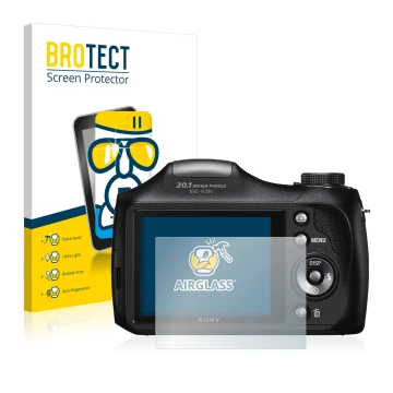 Front side of a product packaging with the brand logo BROTECT. Next to it is the device Sony Cyber-Shot DSC-H300 shown with th