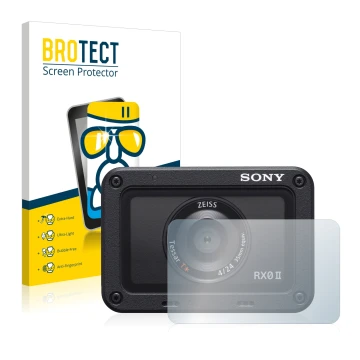Front side of a product packaging with the brand logo BROTECT. Next to it is the device Sony DSC-RX0M2 (RX0 II) (Lens) shown w