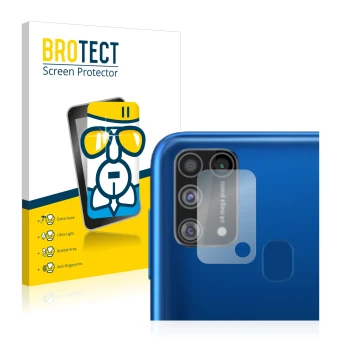 Front side of a product packaging with the brand logo BROTECT. Next to it is the device Samsung Galaxy M31 (ONLY Camera Lens) 