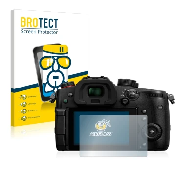 Front side of a product packaging with the brand logo BROTECT. Next to it is the device Panasonic Lumix DC-GH5 II shown with t