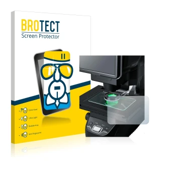 Front side of a product packaging with the brand logo BROTECT. Next to it is the device Keyence IM-7030 Glass plate shown with