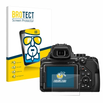 Front side of a product packaging with the brand logo BROTECT. Next to it is the device Nikon Coolpix P1100 shown with the cor