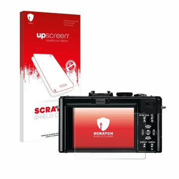 Front side of a product packaging with the brand logo upscreen. Next to it is the device Leica D-Lux 5 shown with the correspo