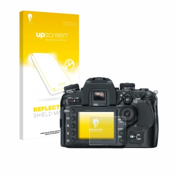 Front side of a product packaging with the brand logo upscreen. Next to it is the device Konica Minolta Dynax 7D shown with th