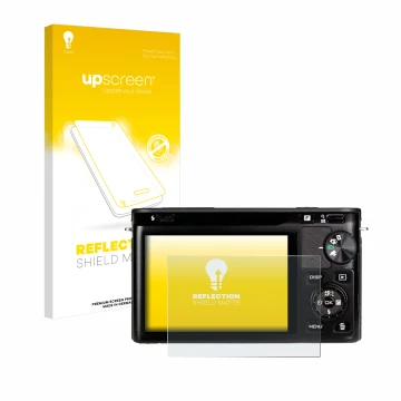 Front side of a product packaging with the brand logo upscreen. Next to it is the device Nikon 1 J1 shown with the correspondi