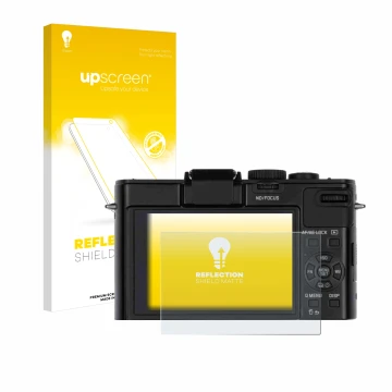 Front side of a product packaging with the brand logo upscreen. Next to it is the device Leica D-Lux 6 shown with the correspo