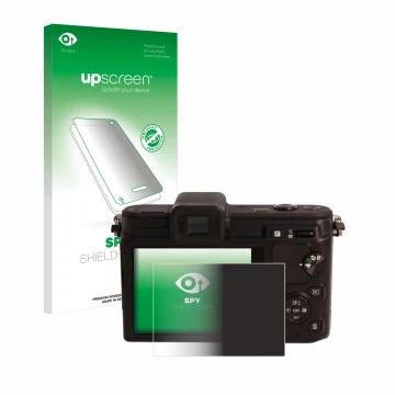 Front side of a product packaging with the brand logo upscreen. Next to it is the device Nikon 1 V1 shown with the correspondi