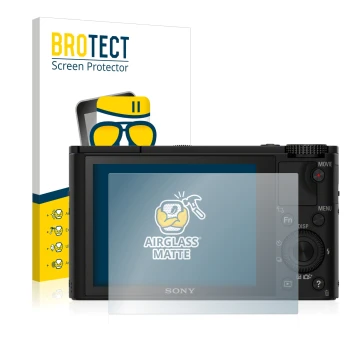 Front side of a product packaging with the brand logo BROTECT. Next to it is the device Sony Cyber-Shot DSC-RX100 shown with t