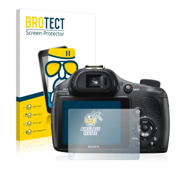 Front side of a product packaging with the brand logo BROTECT. Next to it is the device Sony Cyber-Shot DSC-HX400V shown with 