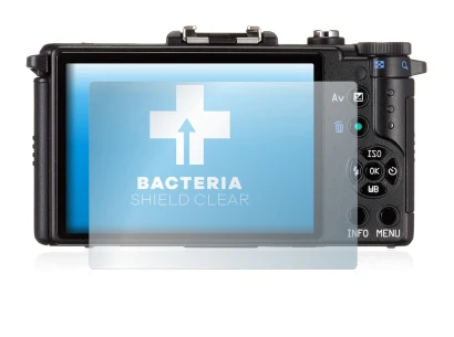 Image of the device Pentax Q with a wide variety of screen protectors.