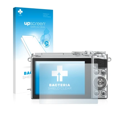 Front side of a product packaging with the brand logo upscreen. Next to it is the device Nikon 1 J5 shown with the correspondi