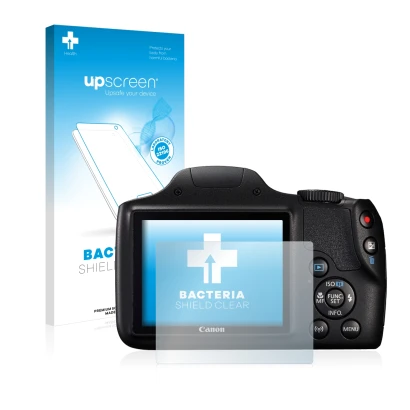 Front side of a product packaging with the brand logo upscreen. Next to it is the device Canon PowerShot SX540 HS shown with t