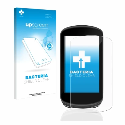 Front side of a product packaging with the brand logo upscreen. Next to it is the device Garmin Edge 1030 Plus shown with the