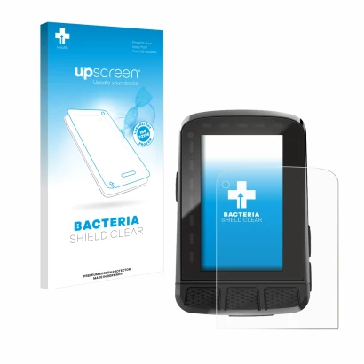 Front side of a product packaging with the brand logo upscreen. Next to it is the device Wahoo Elemnt Roam V2 GPS shown with t