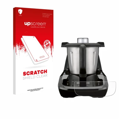 Front side of a product packaging with the brand logo upscreen. Next to it is the device SilverCrest Monsieur Cuisine compact 