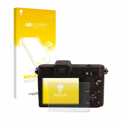 Front side of a product packaging with the brand logo upscreen. Next to it is the device Nikon 1 V1 shown with the correspondi