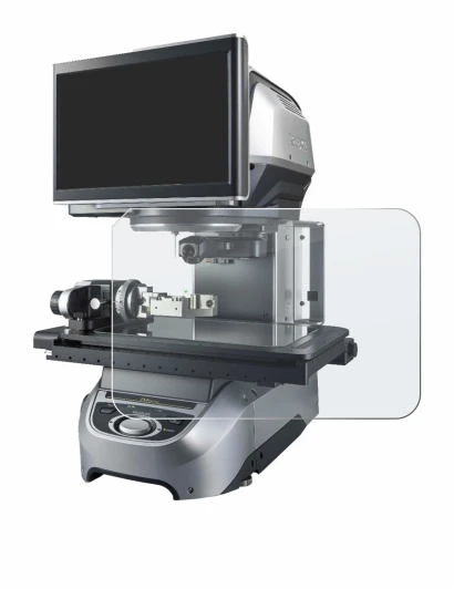 Image of the device Keyence IM-8030 Glass plate with a wide variety of screen protectors.
