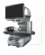 Image of the device Keyence IM-8020 Glass plate with a wide variety of screen protectors.